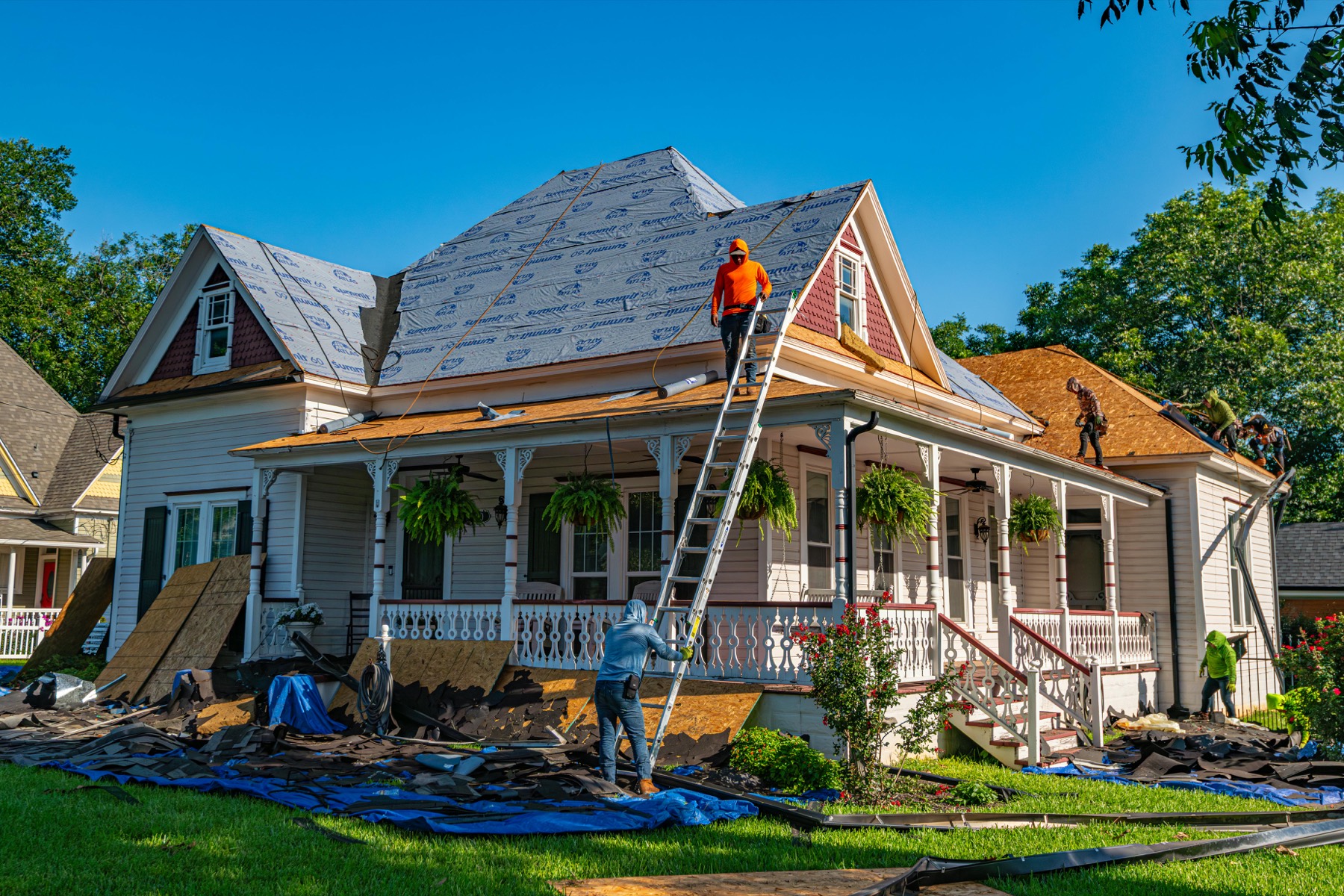 Pulse Roofing crew assessing storm damage on Atlanta roof