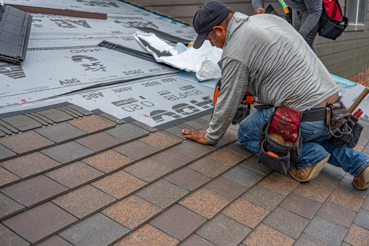 Pulse Roofing crew installing shingles in Atlanta